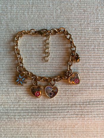 Bracelet en métal doré avec charms La Reine des Neiges Disney