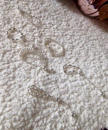 Lot de 6 bagues avec chainette reglable couleur argent