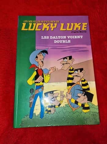 Livre lucky luke les dalton voient double