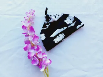 Très beau bonnet en tissus mixte 3 mois