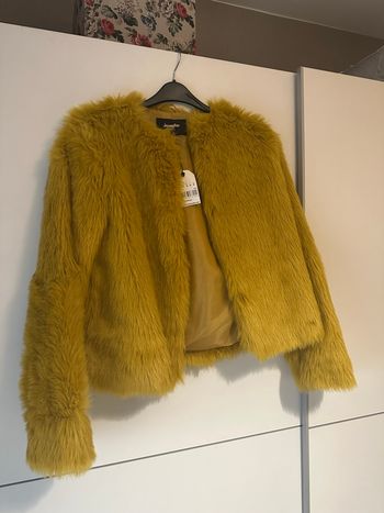 Veste fausse fourrure