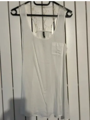 Joli débardeur  Naf Naf taille 36 en parfait état