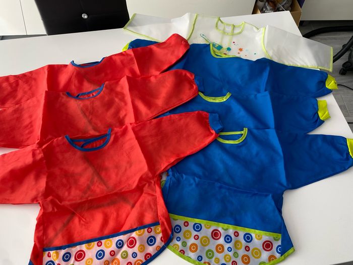 Lot tabliers / bavoirs mixtes