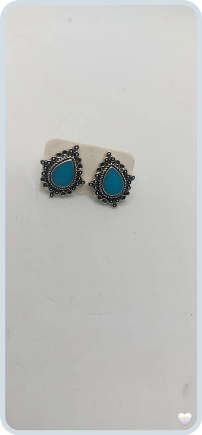 belle paire de boucles d oreilles en acier argenté