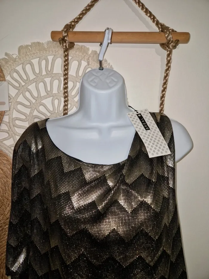 Haut 🚺 - photo numéro 3