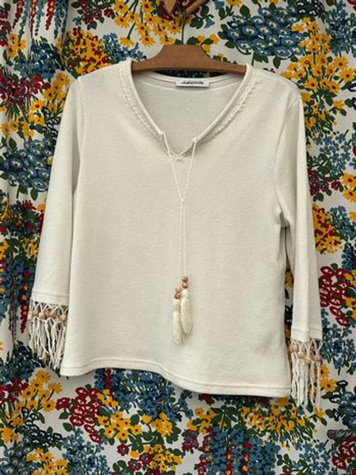 Pull crème avec perles en bois