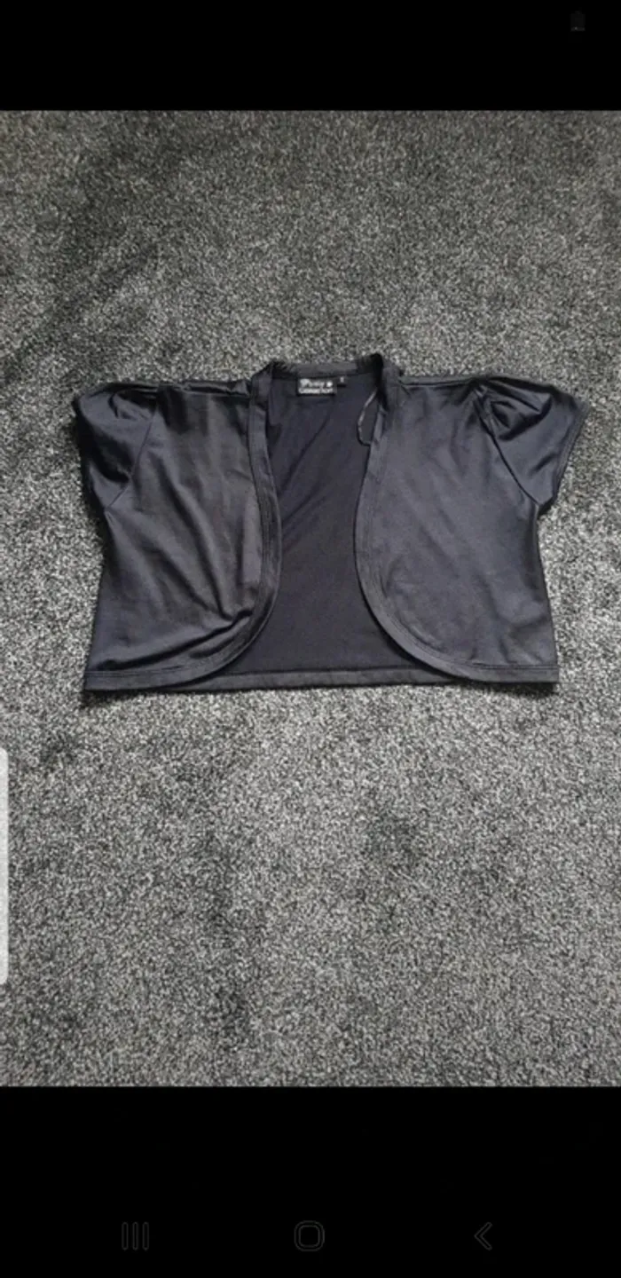 Boléro noir taille S
Marque party collection