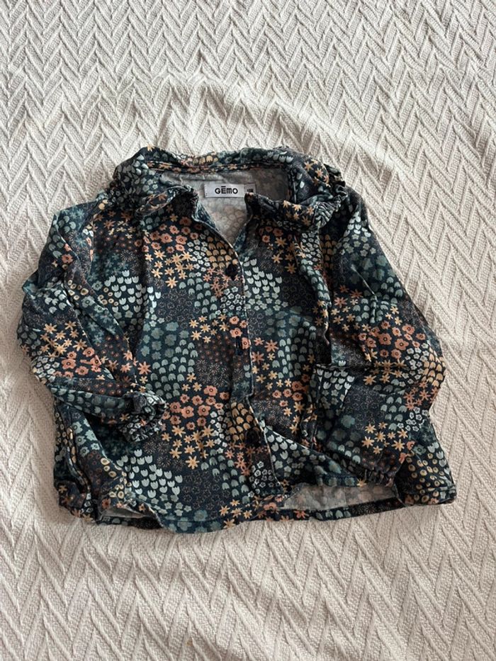 Blouse bleu à fleurs