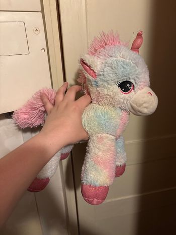 Peluche licorne en excellent état