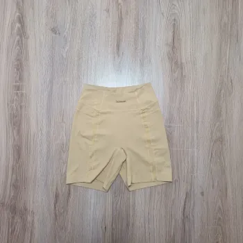 Short gymshark femme jaune S