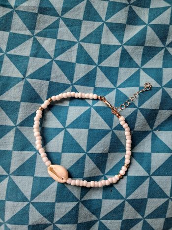 Chaine chevilles coquillages