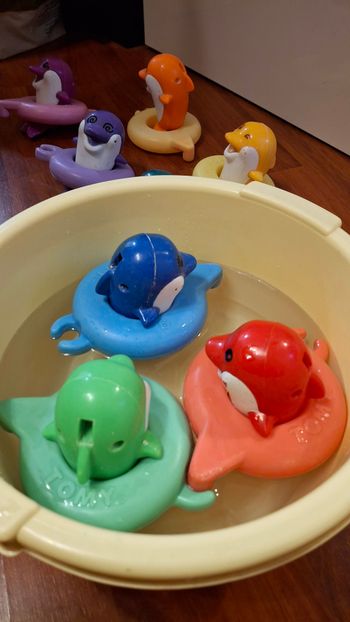 Dauphins éveil bébé de bain Tomy