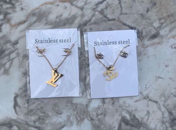 Bijoux 2 parrures louisv et chnl