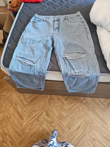 Jean large bleu craqué t48 curve