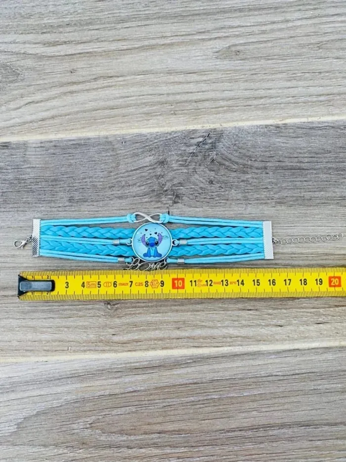 Joli bracelet neuf stitch bleu turquoise - photo numéro 3