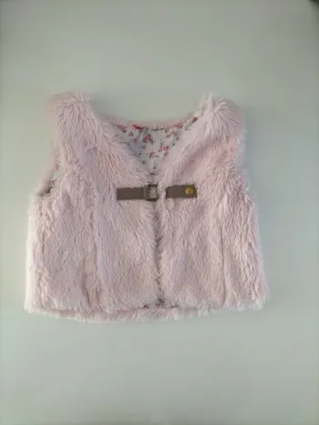 Gilet sans manche moumoute