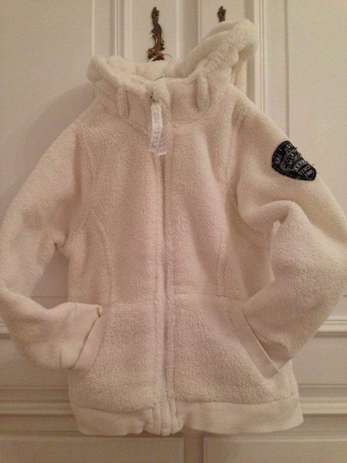 Gilet à capuche en fourrure polaire