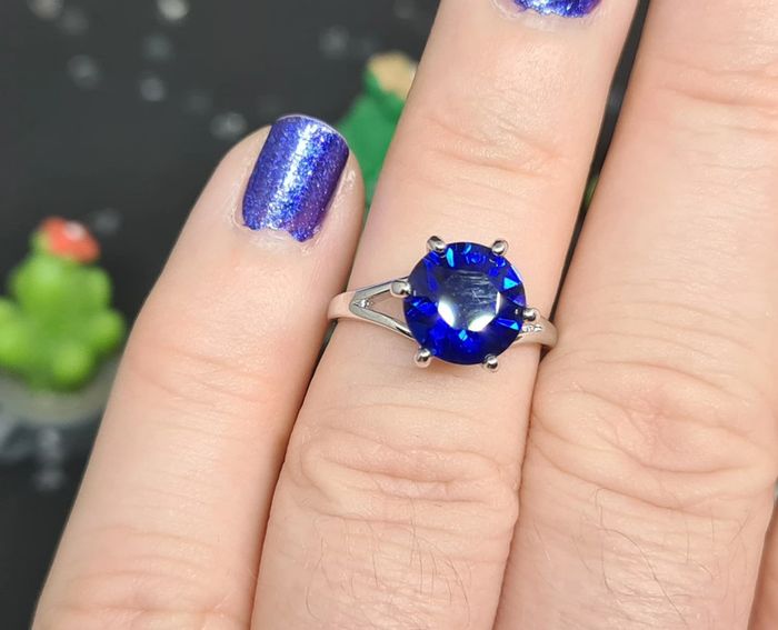 Bague fantaisie argentée avec pierre bleue
