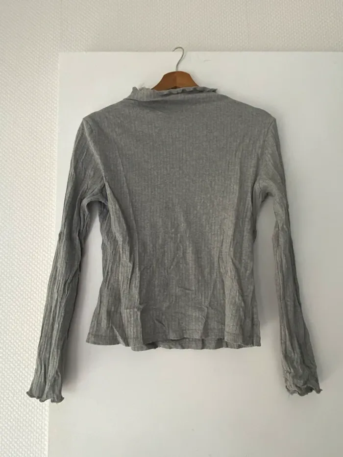 Pull col roulé