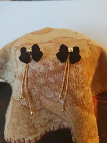 Boucles d'oreilles noeud de papillon