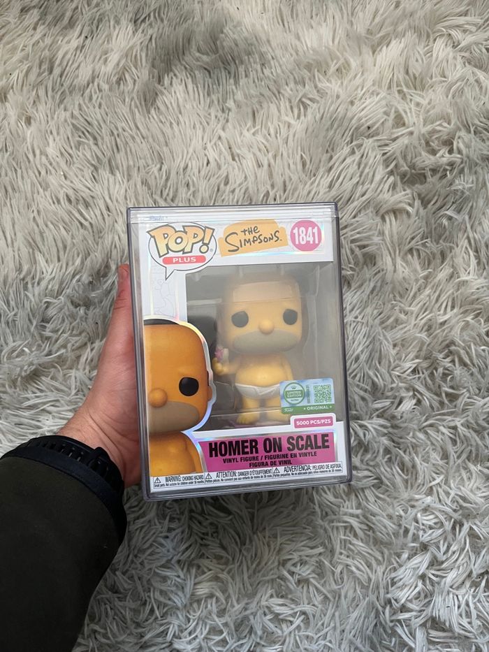 Funko Pop! Plus Homer on Scale with Pop! Protector