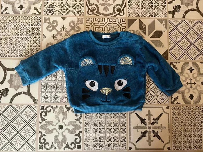 Pull tout doux avec une petite tête de chat / tigre