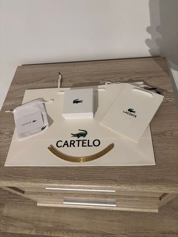 Bracelet Lacoste doré neuf
