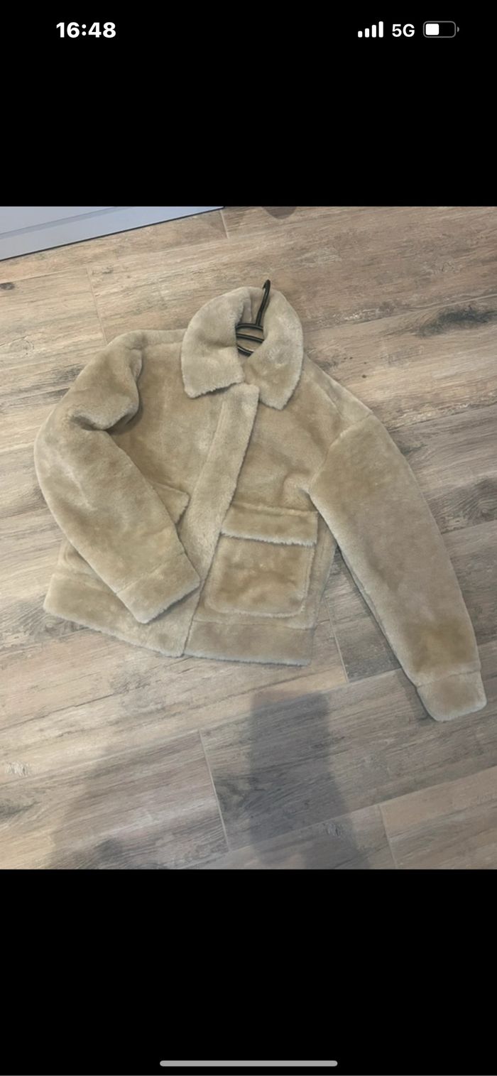 Veste en fausse fourrure beige