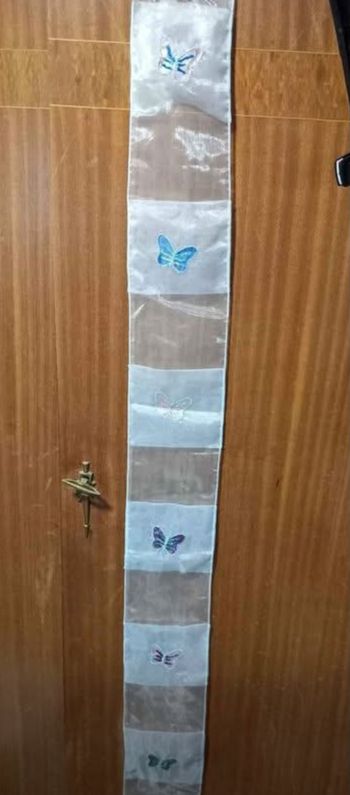 Petit voilage avec papillons