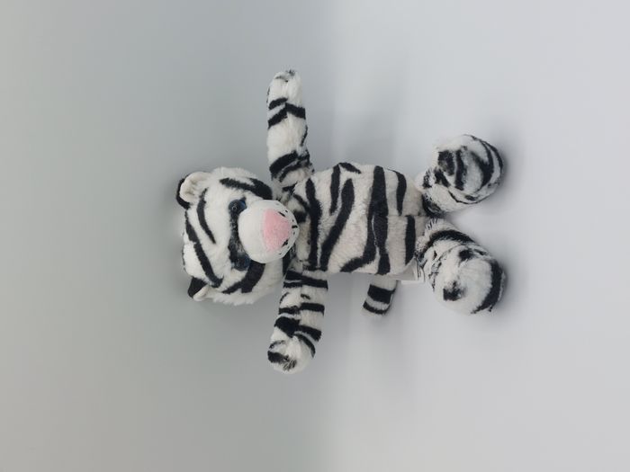 Peluche doudou tigre blanc noir KINDER FERRERO yeux bleus nez rose 25 cm TTBE
