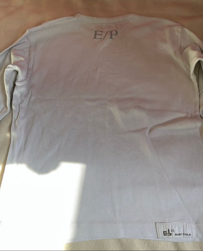 Pull fin east pole 14 ans