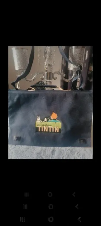 Porte documents tintin brodé en excellent état