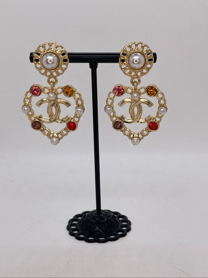 Boucles d’oreilles pendantes cœur dorées - photo numéro 5