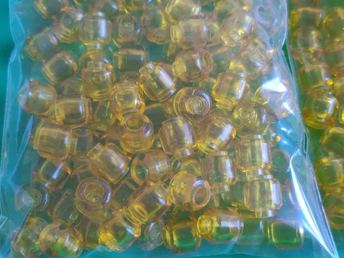 Lot 200 pièces têtes jaune transparent Lego - en parfait état - vrai Lego - photo numéro 4