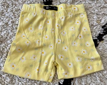 Cycliste  jaune motif pâquerette taille 2/3 ans neuf