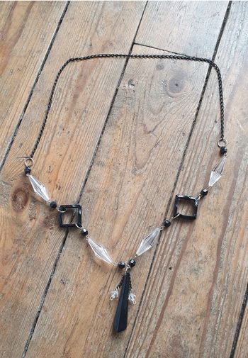 Collier perles noires et transparentes