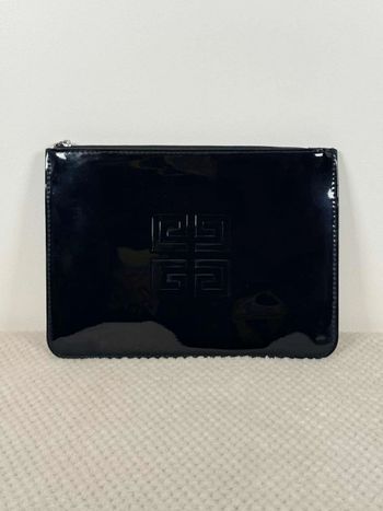 Jolie pochette ou trousse à maquillage Givenchy noir brillant