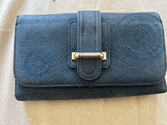 Porte feuille desigual