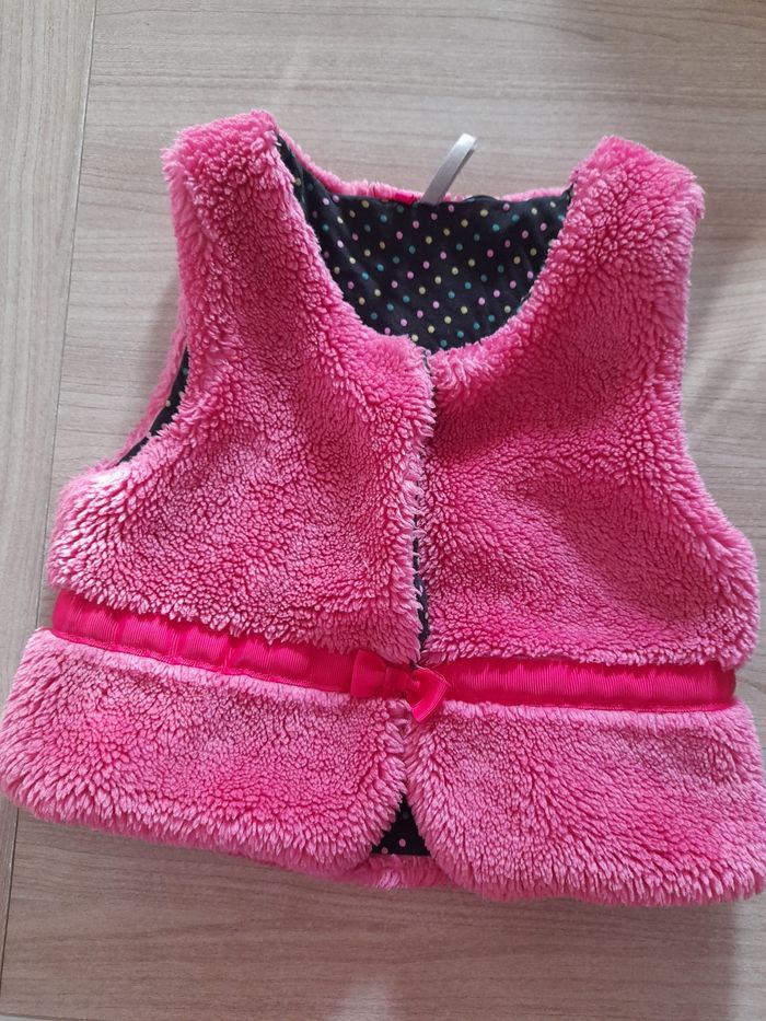 Veste sans manche rose 6 ans