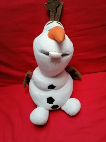 Peluche olaf et reine des neiges