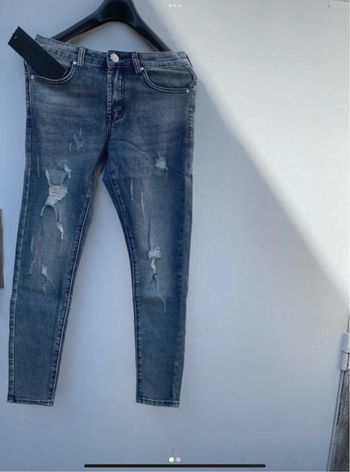 Jeans slim trouée