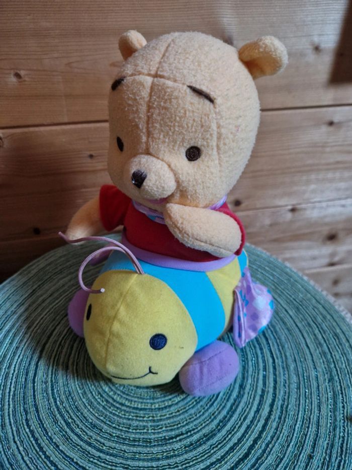 Winnie l'ourson sur son papillon - photo numéro 2