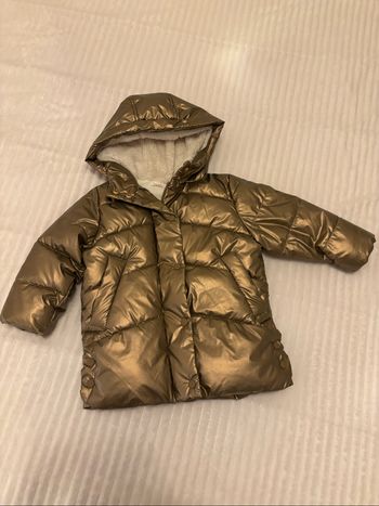 Magnifique doudoune doré