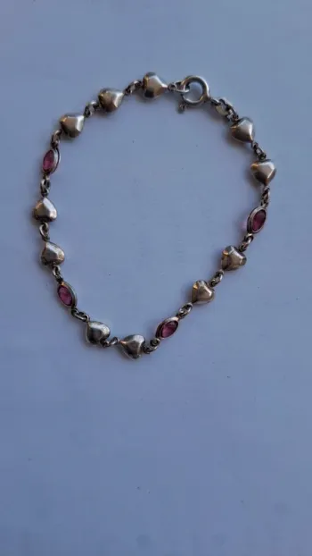 Bracelet cœurs et rose en argent