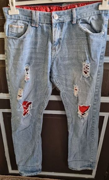 Jeans à trous taille 44 mixte