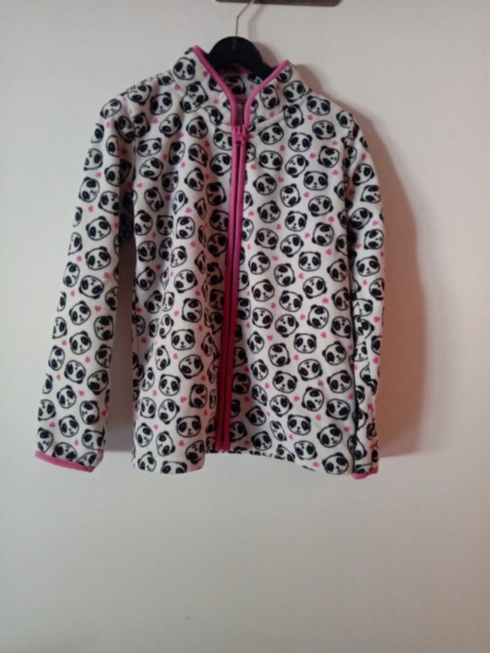 Joli pull à tirette.  8 ans.