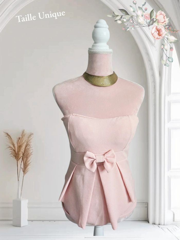 Top péplum rose pâle