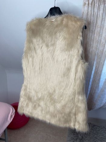 Veste longue sans manche