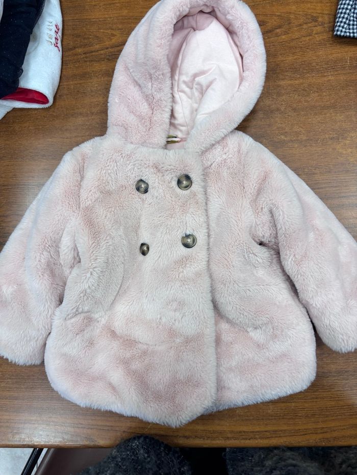 Manteau fausse fourrure