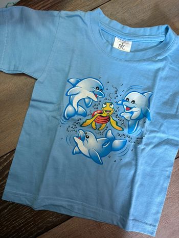T-shirt bleu dauphin tortue neuf 1-2ans